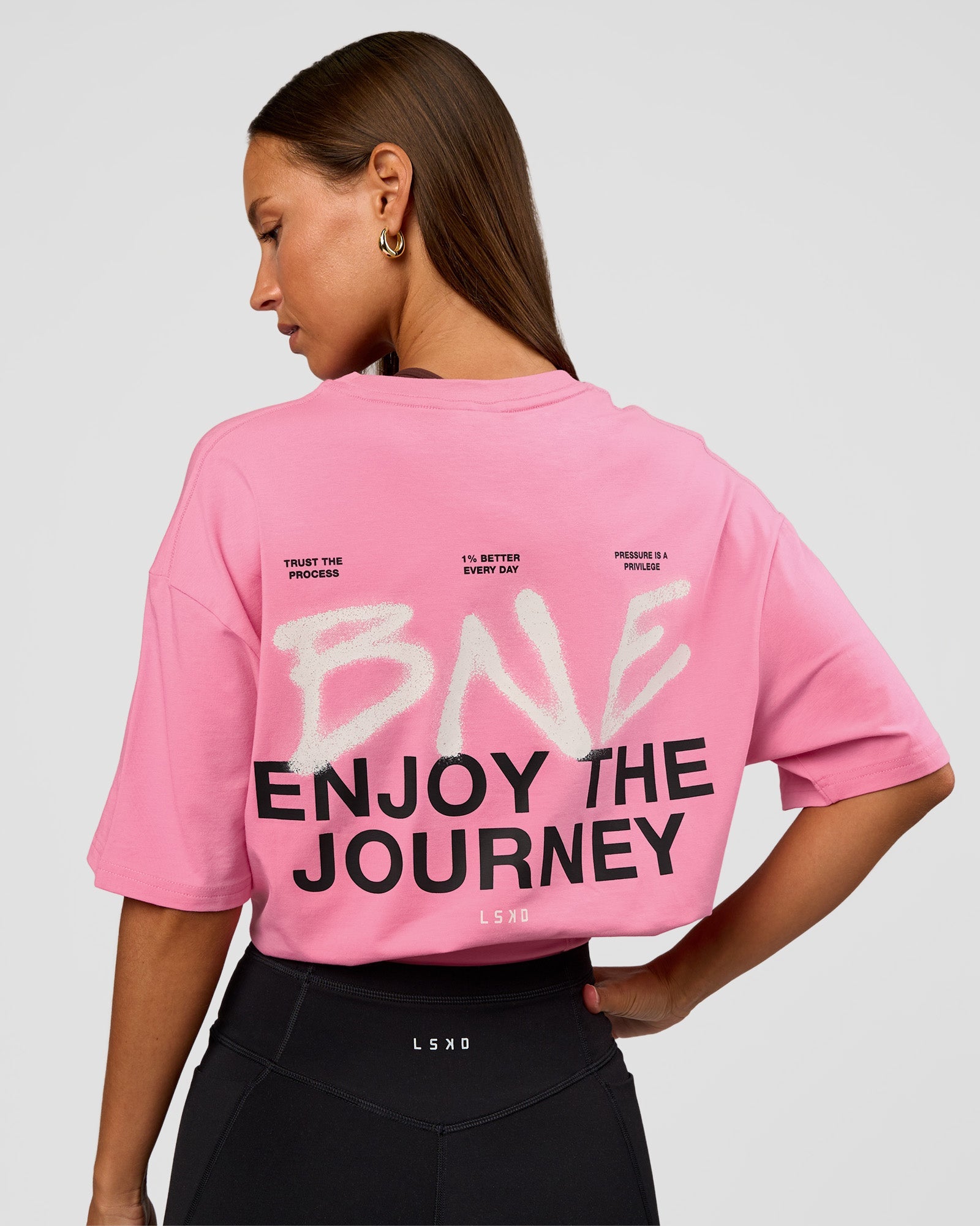 Woman wearing CFT BNE 26 FLXCotton Oversized Tee in Candy Pink | Model:Brylee | Size:XS