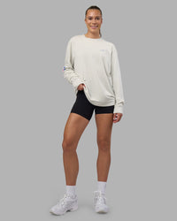 Woman wearing Cali FLXCotton Oversized Long Sleeve Tee - Digital Mist Washed | Model:Charlize | Size:XS