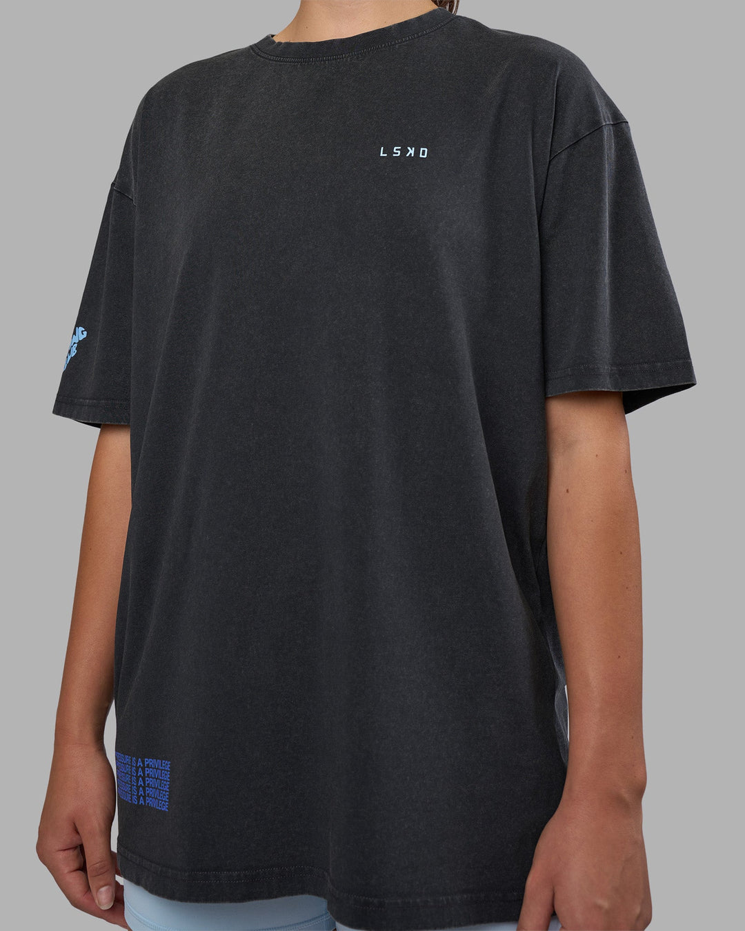 Woman wearing Cali FLXCotton Oversized Tee - Black Washed | Model:Charlize | Size:XS