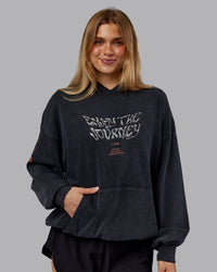 Woman wearing Chrome Washed Oversized Hoodie - Black | Model:Emilie | Size:XS