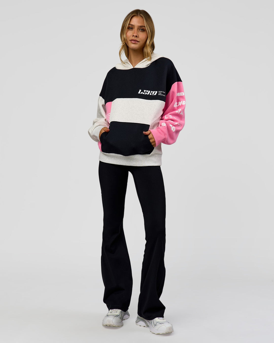 Woman wearing Deconstructed Fleece Hoodie - Caviar-Candy Pink-Grey Marl | Model:Leilani | Size:XS