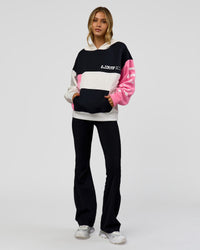 Woman wearing Deconstructed Fleece Hoodie - Caviar-Candy Pink-Grey Marl | Model:Leilani | Size:XS