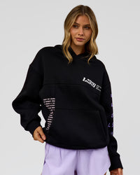 Woman wearing Deconstructed Fleece Hoodie - Caviar-Marshmallow-Pale Lilac | Model:Leilani | Size:XS