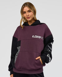 Woman wearing Deconstructed Fleece Hoodie - Caviar-Midnight Plum | Model:Leilani | Size:XS