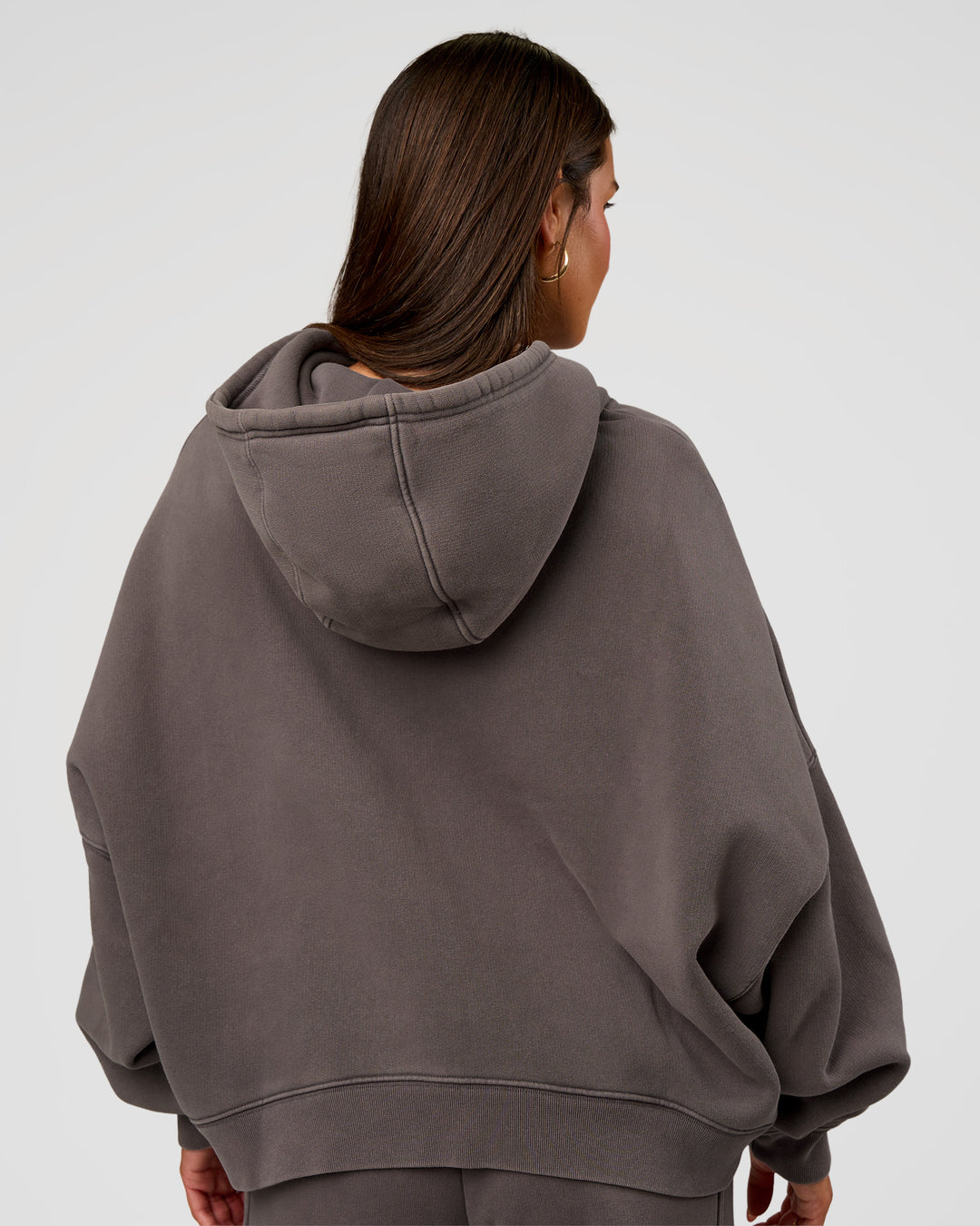 Woman wearing Distort Oversized Hoodie - Duskstone Washed | Model:Bianca | Size:XS - view 2