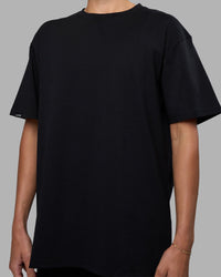 Woman wearing Easy FLXCotton Tee Oversize - Black | Model:Katie | Size:XS | Thumbnail Index: 6