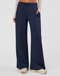 Woman wearing Elevate SoftTouch Wide Leg Pant - Future Navy | Model:Georgia | Size:XS