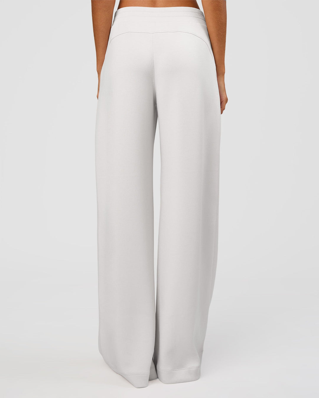 Woman wearing Elevate SoftTouch Wide Leg Pant Tall - Clay | Model:Georgia | Size:XS