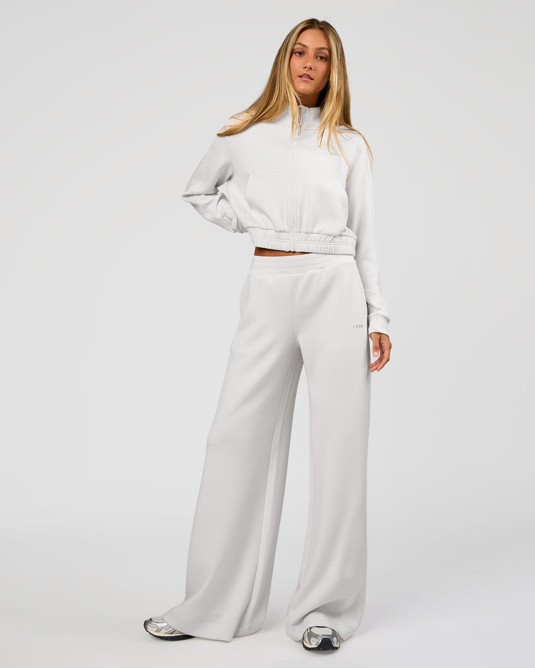 Woman wearing Elevate SoftTouch Wide Leg Pant Tall - Clay | Model:Georgia | Size:XS