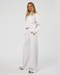 Woman wearing Elevate SoftTouch Wide Leg Pant Tall - Clay | Model:Georgia | Size:XS