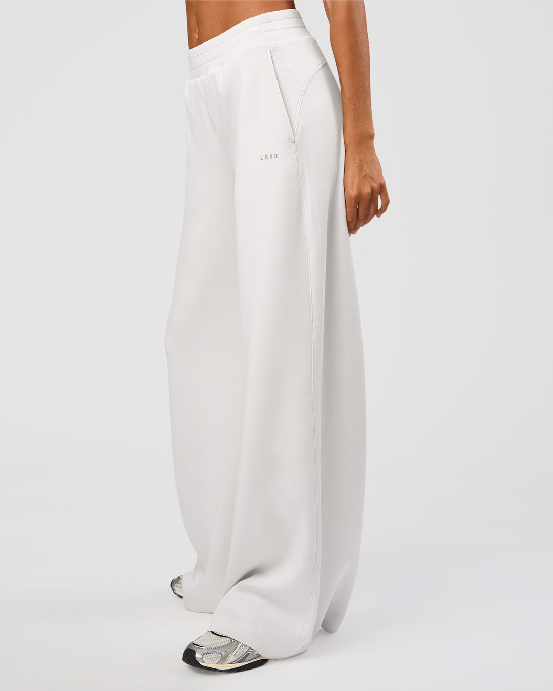 Woman wearing Elevate SoftTouch Wide Leg Pant Tall - Clay | Model:Georgia | Size:XS