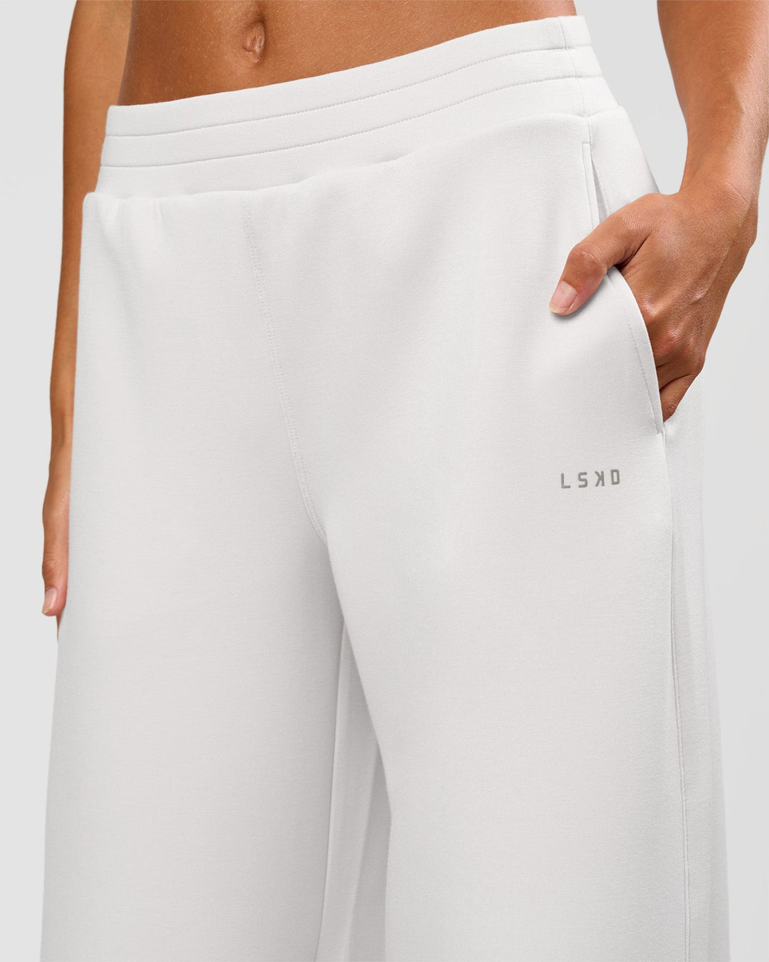 Woman wearing Elevate SoftTouch Wide Leg Pant Tall - Clay | Model:Georgia | Size:XS