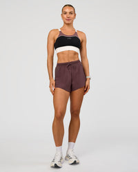 Woman wearing Elevated Accelerate Sports Bra - Black-Multi | Model:Maja | Size:XS