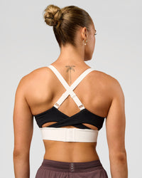 Woman wearing Elevated Accelerate Sports Bra - Black-Multi | Model:Maja | Size:XS | Thumbnail Index: 1