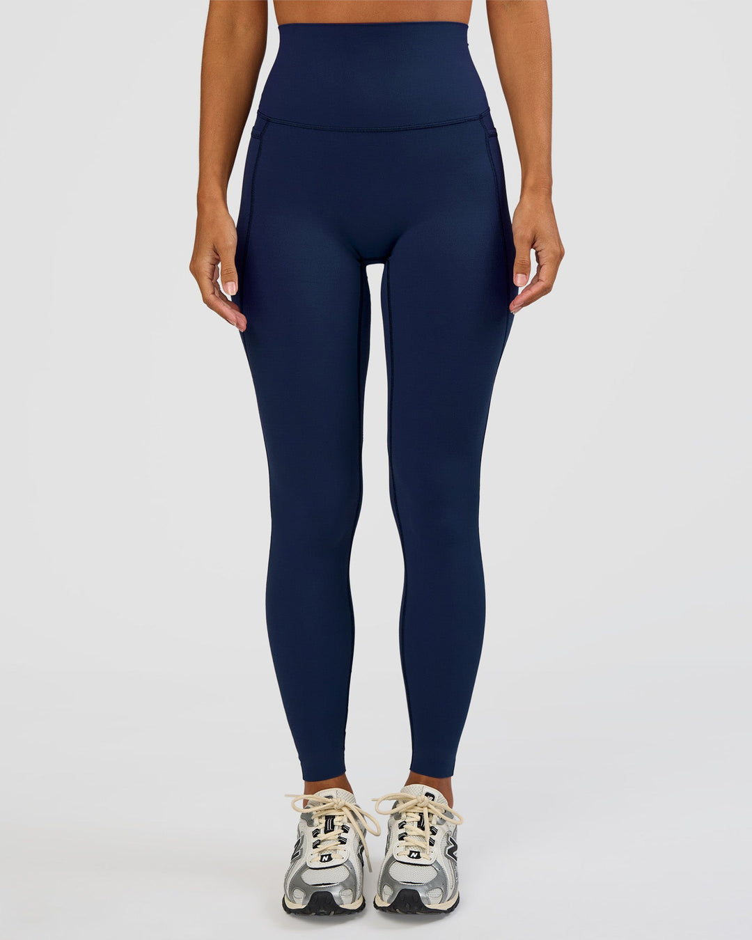 Woman wearing Elixir Ultra High-Rise Full Length Legging Pockets - Future Navy | Model:Brylee | Size:XS