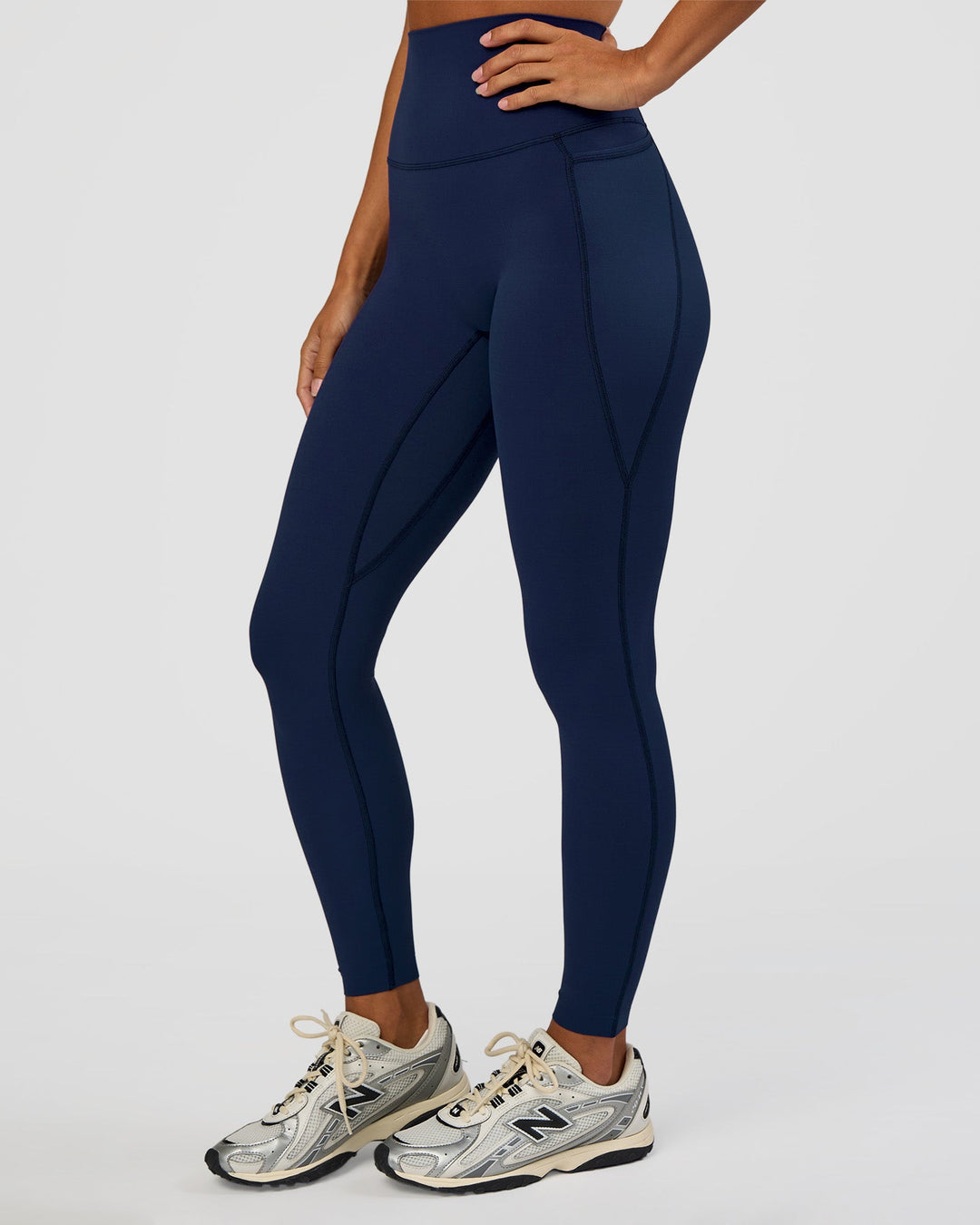 Woman wearing Elixir Ultra High-Rise Full Length Legging Pockets - Future Navy | Model:Brylee | Size:XS