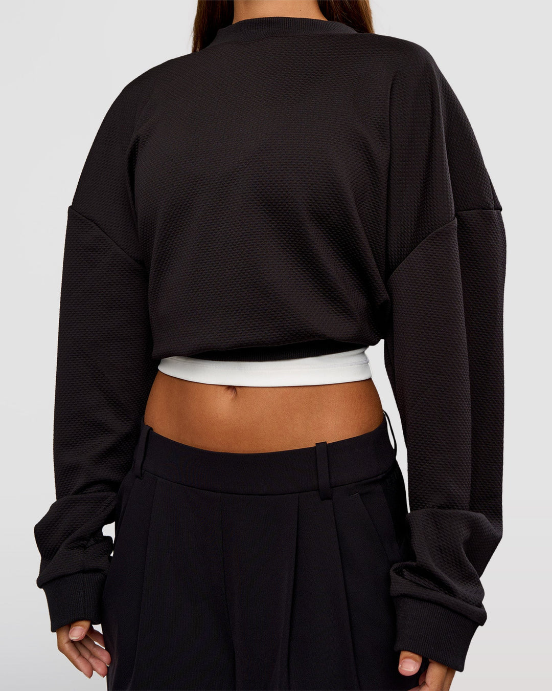 Woman wearing Everyday Elevation Waffle Oversized Sweater - Black | Model:Brylee | Size:XS