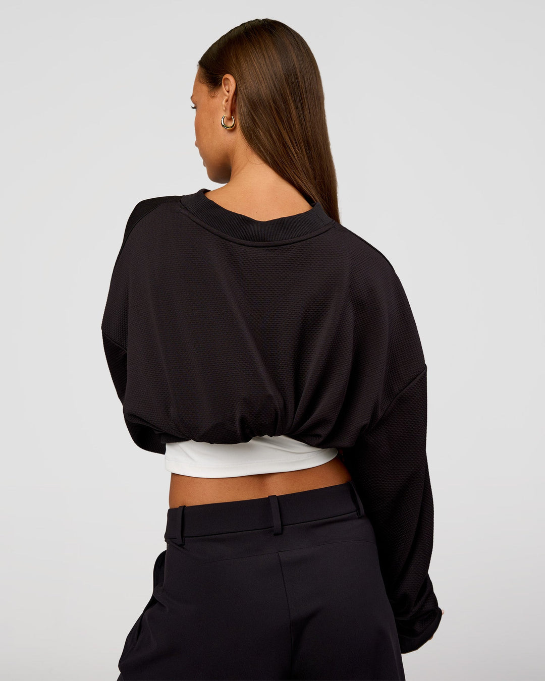 Woman wearing Everyday Elevation Waffle Oversized Sweater - Black | Model:Brylee | Size:XS