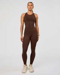 Woman wearing Flow Performance Tank 2.0 - Hot Chocolate | Model:Maja | Size:XS