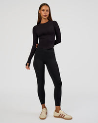 Woman wearing Flow Rib Long Sleeve Tee - Black | Model:Brylee | Size:XS