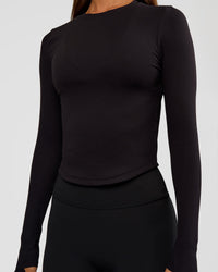 Woman wearing Flow Rib Long Sleeve Tee - Black | Model:Brylee | Size:XS