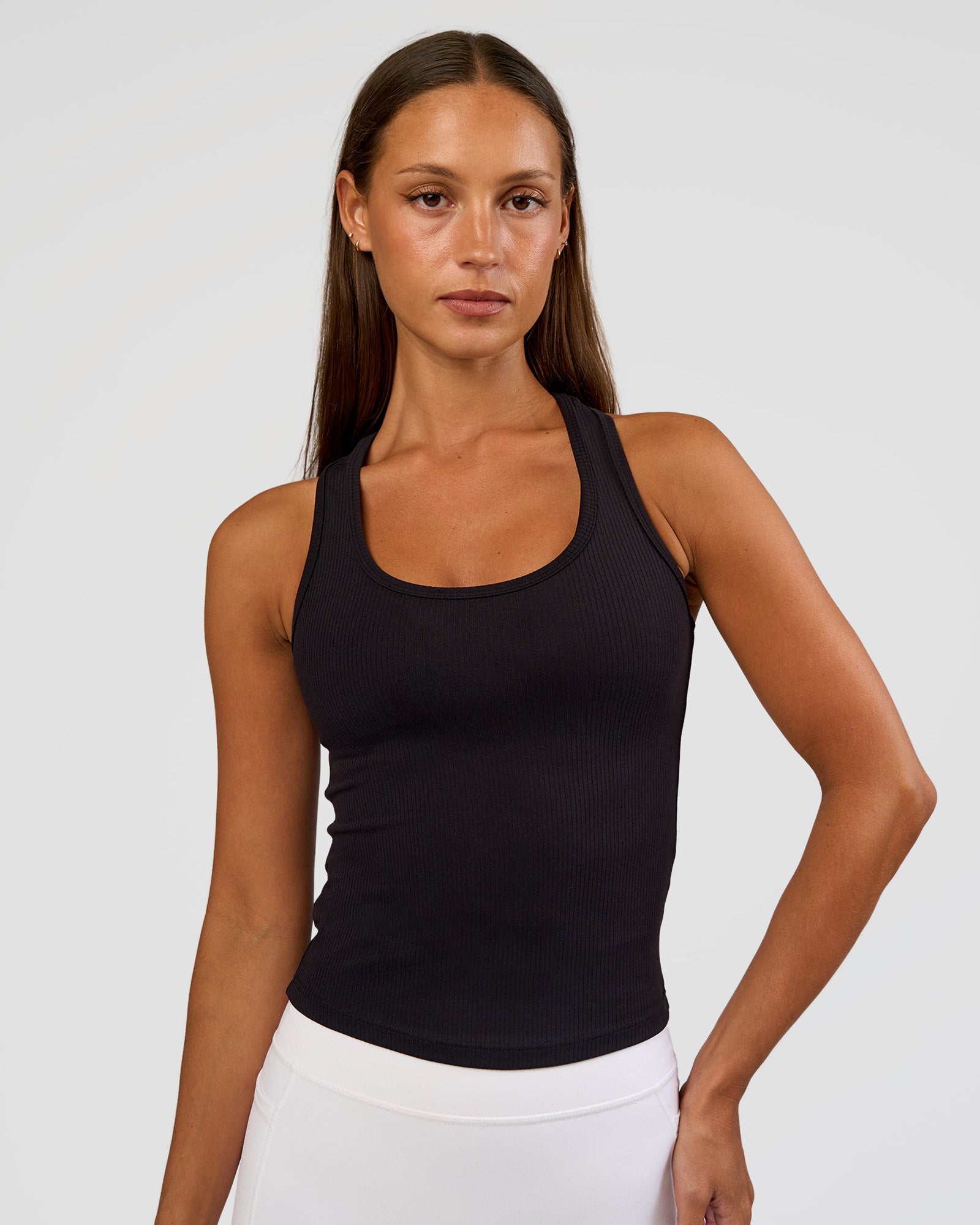 Woman wearing Flow Rib Scoop Neck Tank - Black | Model:Brylee | Size:XS