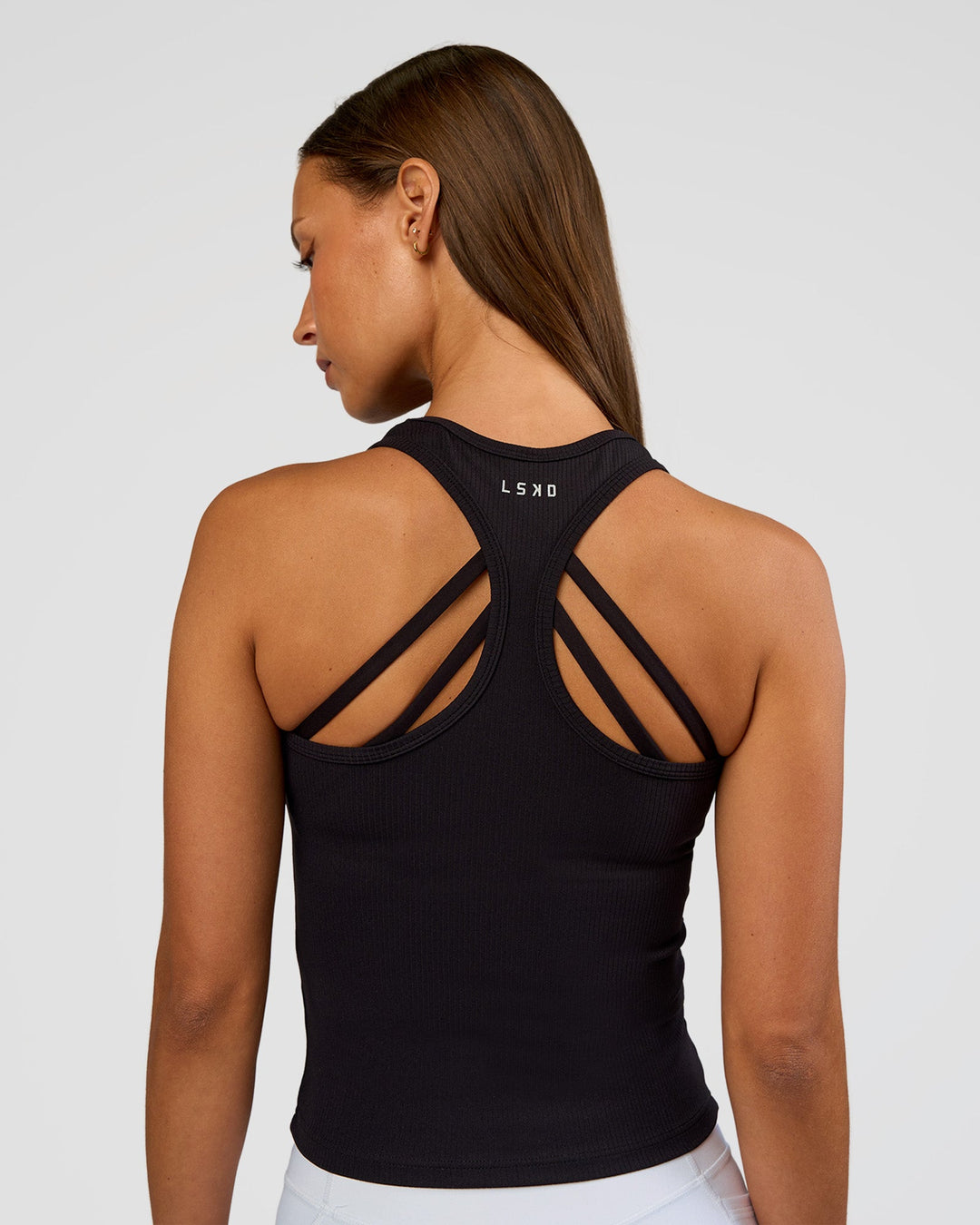 Woman wearing Flow Rib Scoop Neck Tank - Black | Model:Brylee | Size:XS