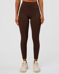 Woman wearing Fusion Ultra High-Rise 7/8 Legging Pockets - Hot Chocolate | Model:Charli | Size:XS