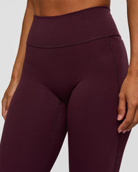 Woman wearing Fusion V-Contour High-Rise Flared Petite Legging Pockets - Cherry Lacquer | Model:Brylee | Size:XS | Thumbnail Index: 7