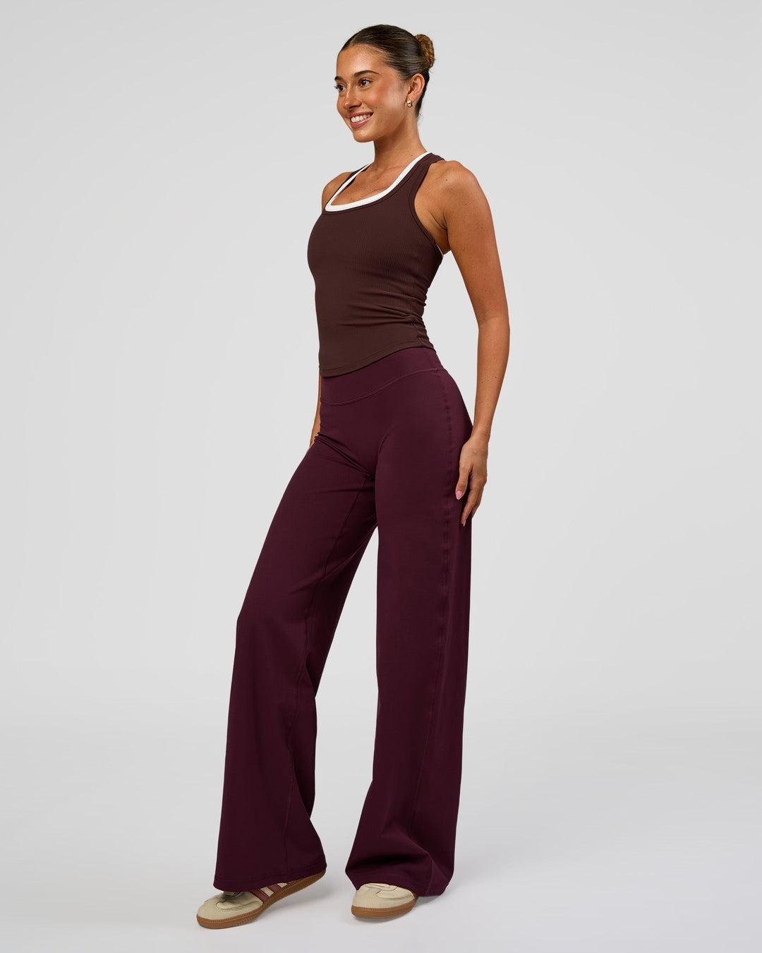 Woman wearing Fusion V-Contour High-Rise Pant - Cherry Lacquer | Model:Charli | Size:XS