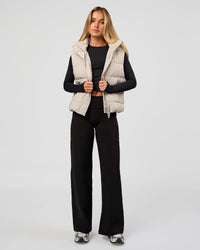 Woman wearing Fusion V-Contour High-Rise Petite Pant - Black | Model:Issy | Size:XS