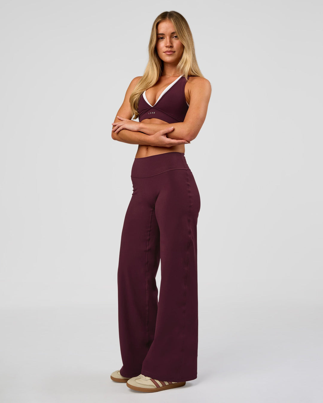 Woman wearing Fusion V-Contour High-Rise Petite Pant - Cherry Lacquer | Model:Issy | Size:XS