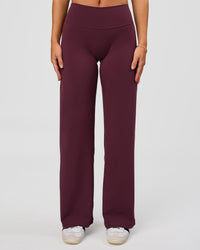 Woman wearing Fusion V-Contour High-Rise Petite Pant - Cherry Lacquer | Model:Issy | Size:XS