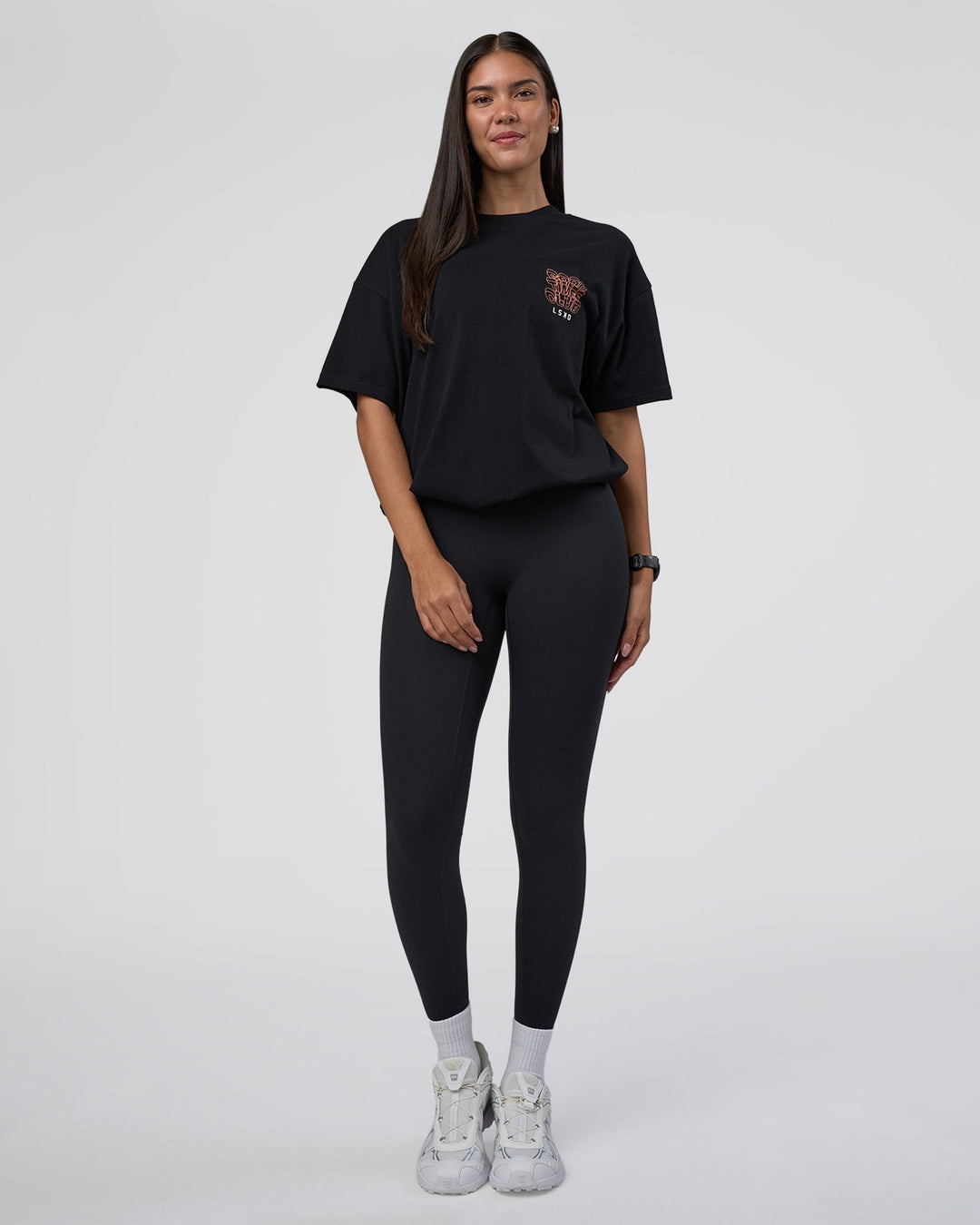 Woman wearing GTC Heavyweight Oversized Tee - Black-Cantaloupe | Model:Rhiley | Size:XS