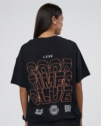 Woman wearing GTC Heavyweight Oversized Tee - Black-Cantaloupe | Model:Rhiley | Size:XS