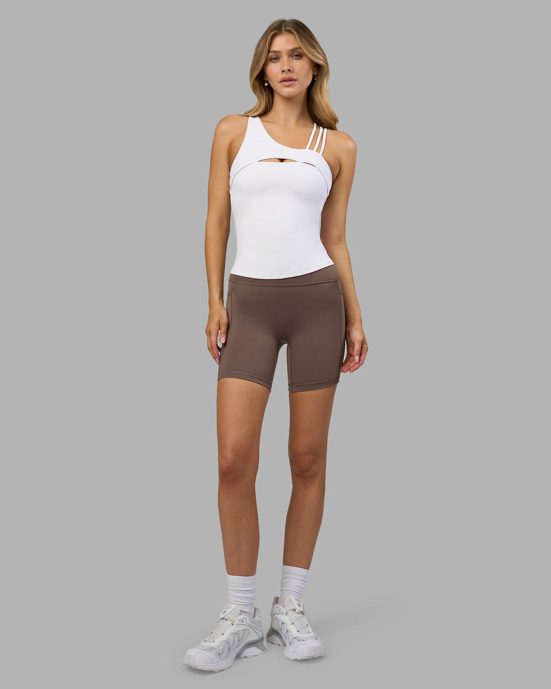 Woman wearing Galvanise Splice Shelf Bra Tank - White | Model:Leilani | Size:XS