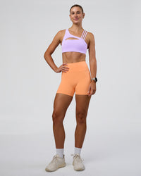 Woman wearing Galvanise Splice Sports Bra - Pale Lilac | Model:Emelia | Size:XS