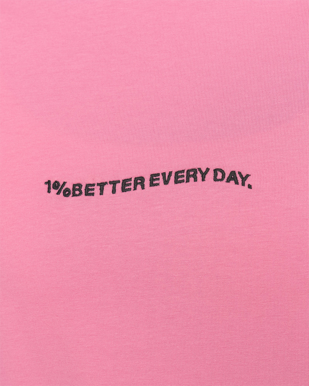 Woman wearing Go-To 1% Better Every Day FLXCotton Oversized Tee - Candy Pink-Black | Model:Amity | Size:XS