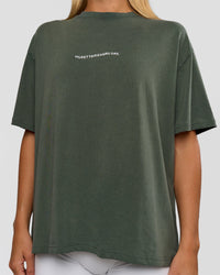 Woman wearing Go-To 1% Better Every Day FLXCotton Oversized Tee - Carbon Green Washed-White | Model:Amity | Size:XS