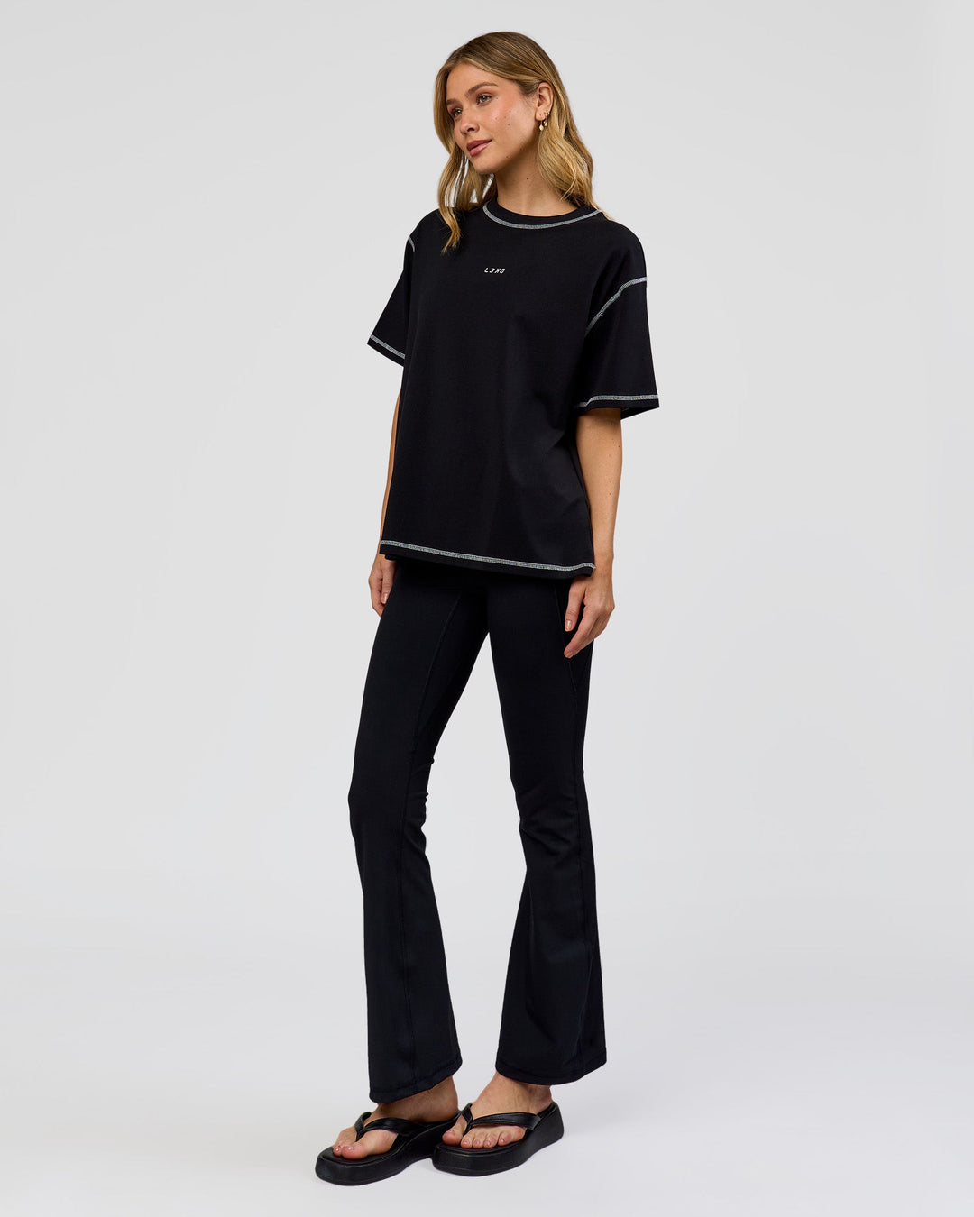 Woman wearing Go-To Contrast Oversized Heavyweight FLXCotton Tee - Black-White | Model:Leilani | Size:XS