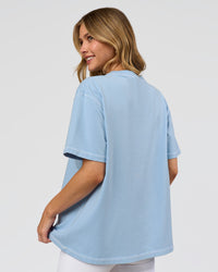 Woman wearing Go-To Contrast Oversized Heavyweight FLXCotton Tee - Open Air Washed-White | Model:Leilani | Size:XS