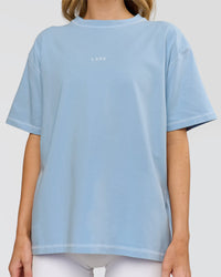 Woman wearing Go-To Contrast Oversized Heavyweight FLXCotton Tee - Open Air Washed-White | Model:Leilani | Size:XS