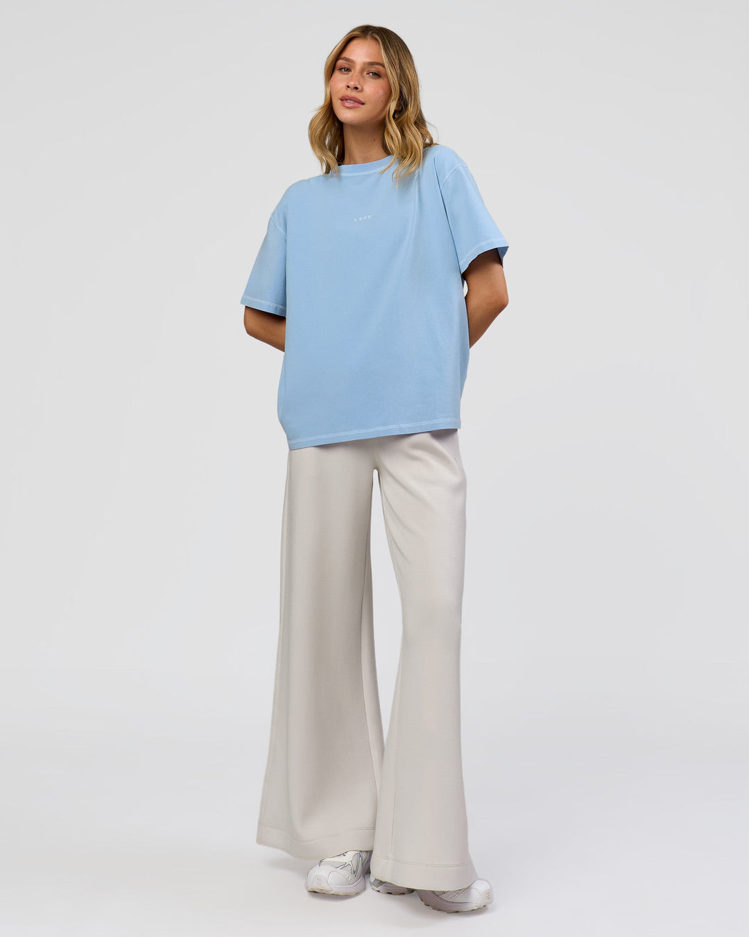 Woman wearing Go-To Contrast Oversized Heavyweight FLXCotton Tee - Open Air Washed-White | Model:Leilani | Size:XS