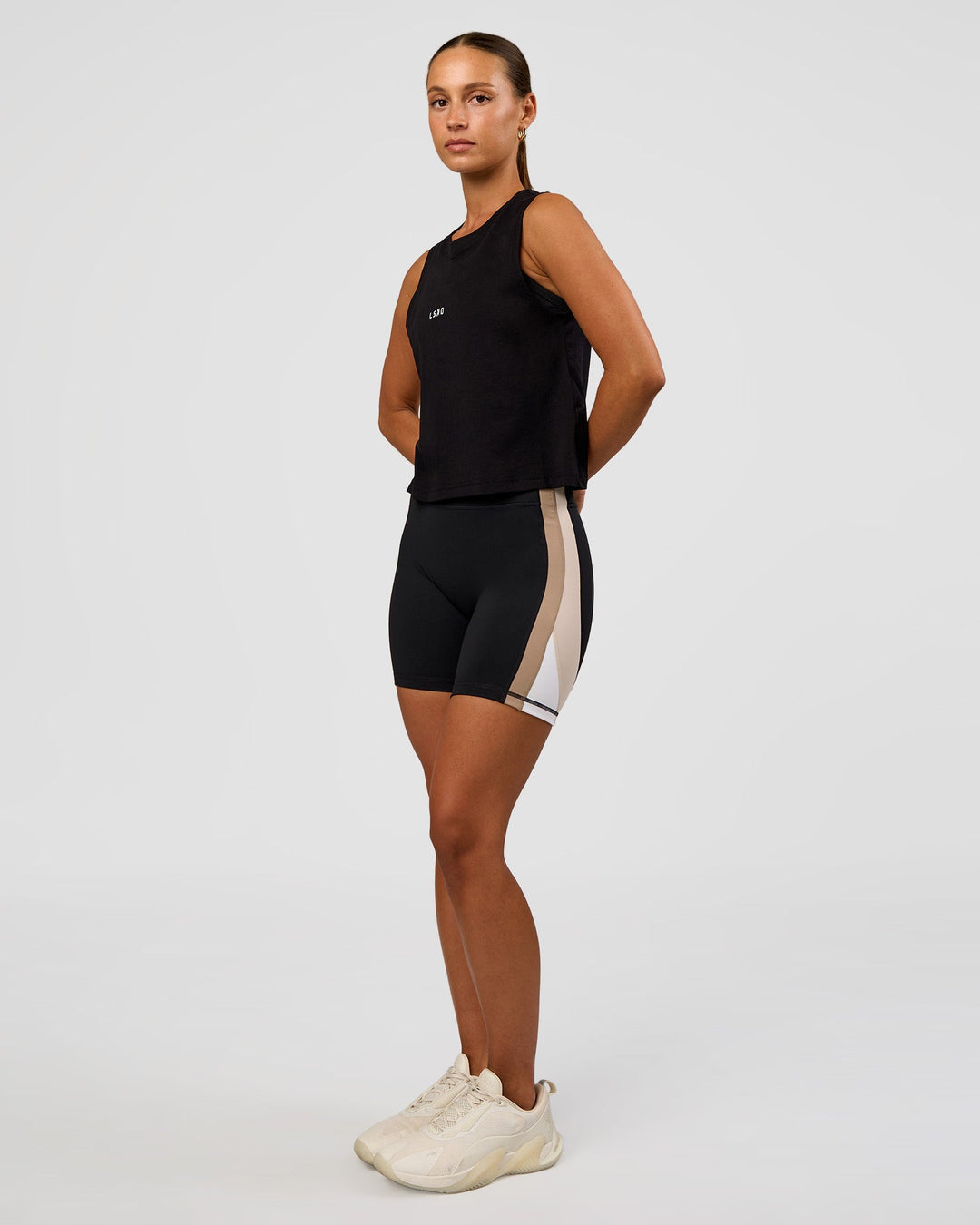 Woman wearing Go-To FLXCotton Midline Tank - Black-White | Model:Brylee | Size:XS