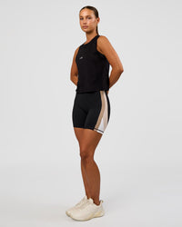Woman wearing Go-To FLXCotton Midline Tank - Black-White | Model:Brylee | Size:XS