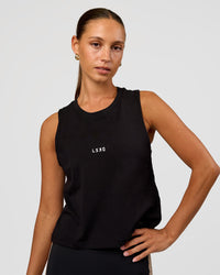 Woman wearing Go-To FLXCotton Midline Tank - Black-White | Model:Brylee | Size:XS