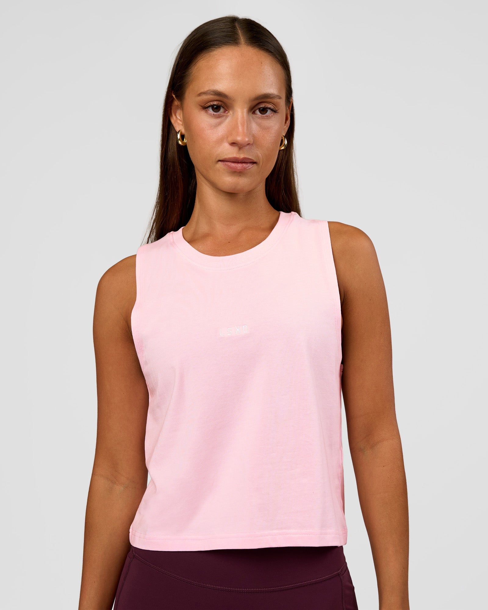 Woman wearing Go-To FLXCotton Midline Tank - Marshmallow-White | Model:Brylee | Size:XS