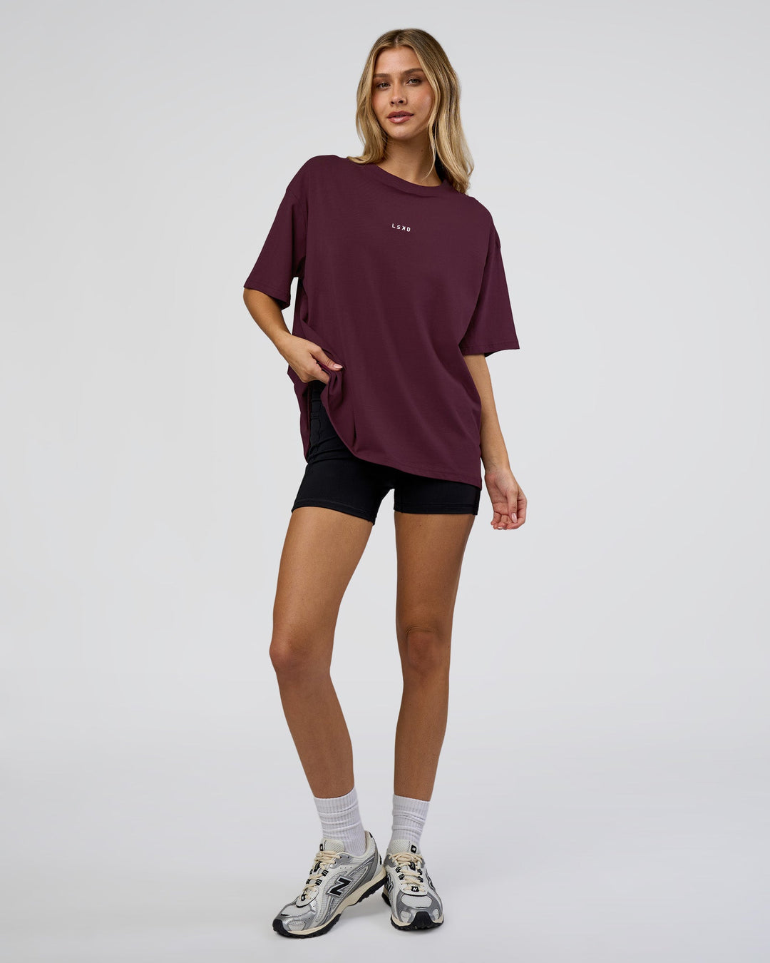 Woman wearing Go-To FLXCotton Oversized Tee - Cherry Lacquer-White | Model:Leilani | Size:XS - view 2
