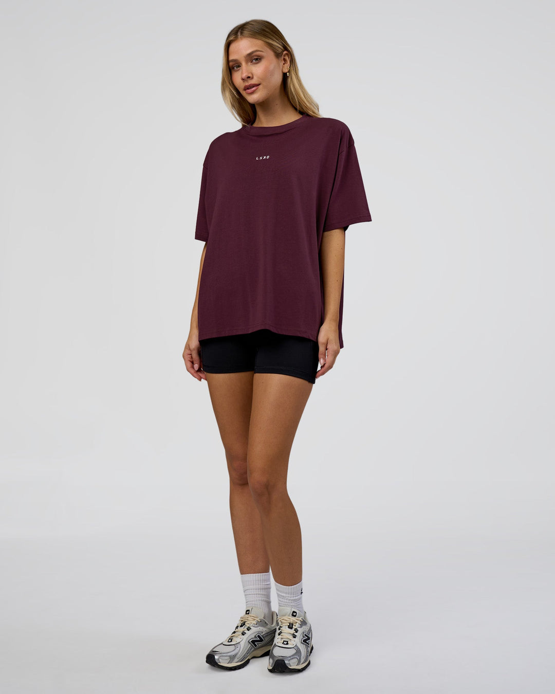 Woman wearing Go-To FLXCotton Oversized Tee - Cherry Lacquer-White | Model:Leilani | Size:XS - view 4