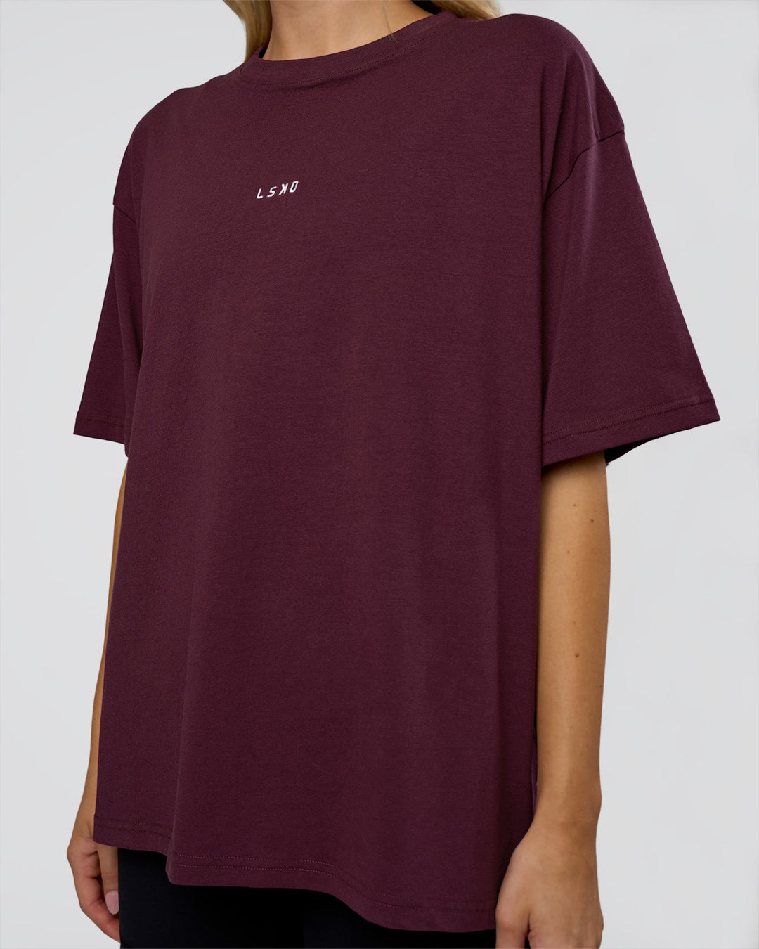 Woman wearing Go-To FLXCotton Oversized Tee - Cherry Lacquer-White | Model:Leilani | Size:XS - view 5